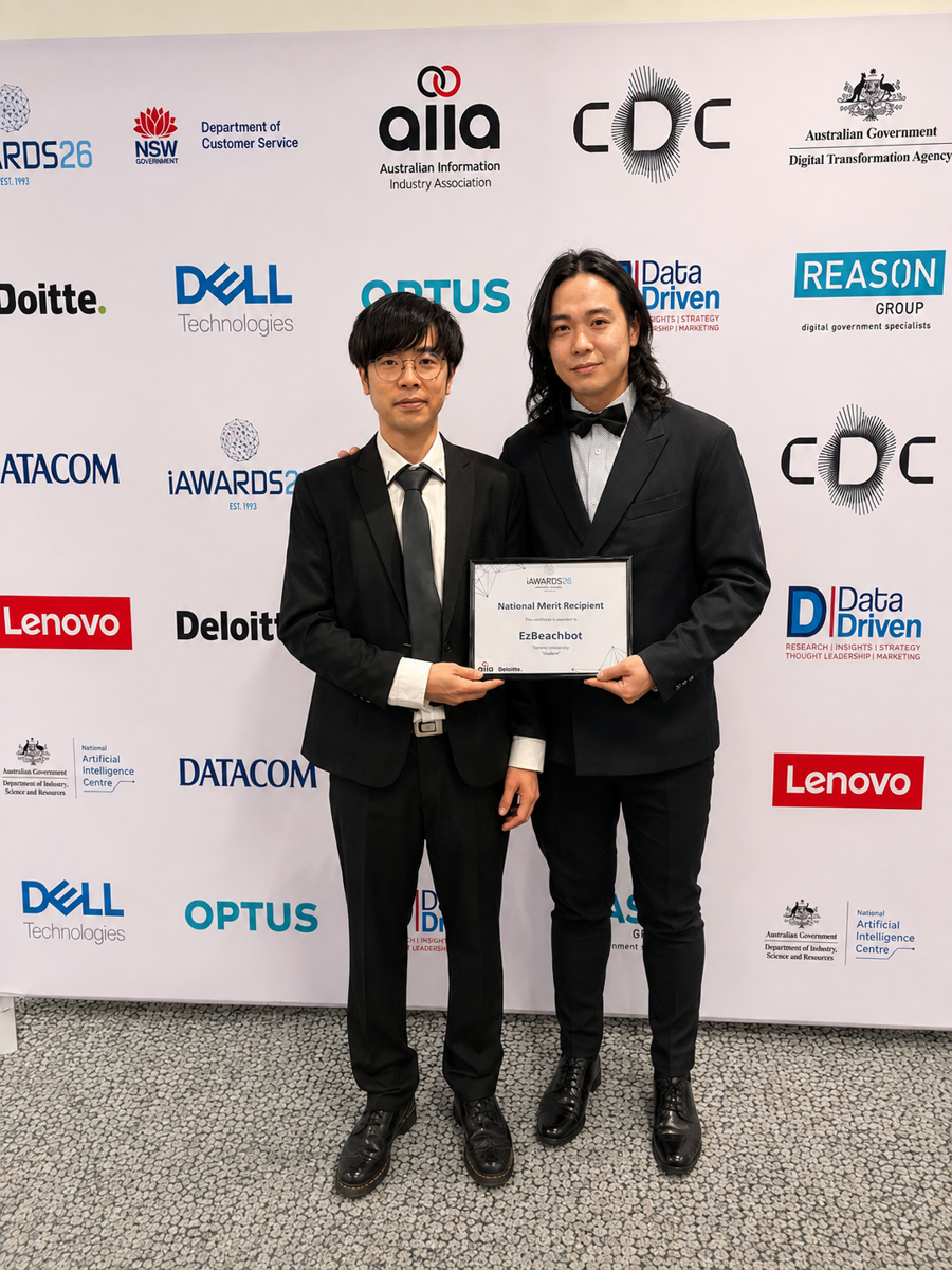 Ka Ho Lui and Aayush Dawadi holding the EzBeachbot National Merit Recipient certificate at the AIIA iAwards 2026 ceremony